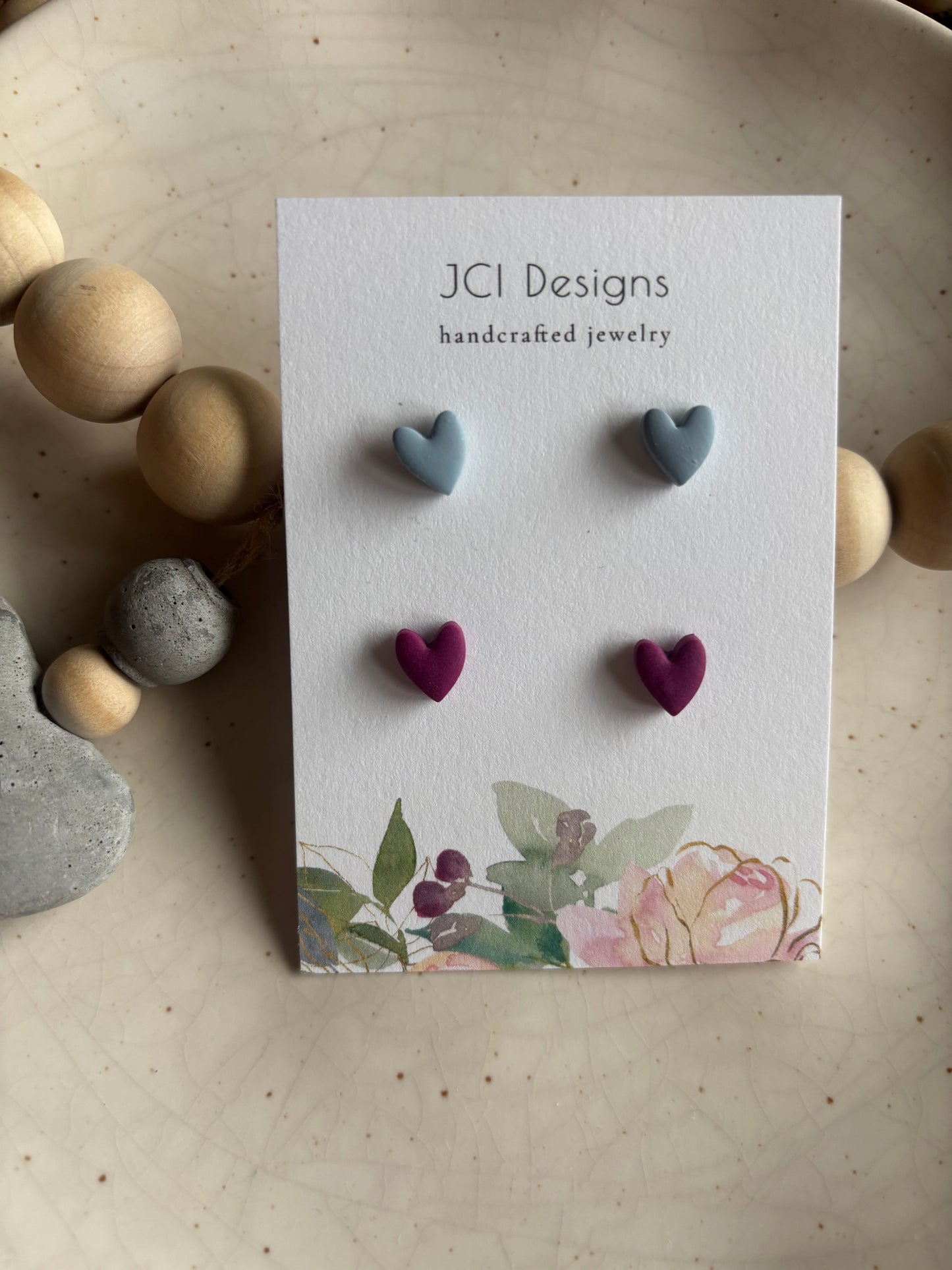 Mini heart studs in blue and purple