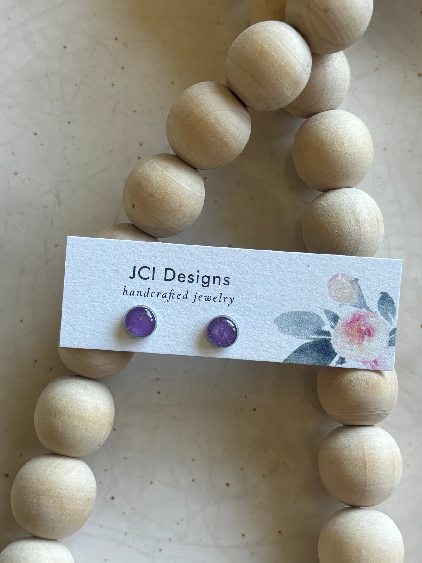 Silver micro studs in purple