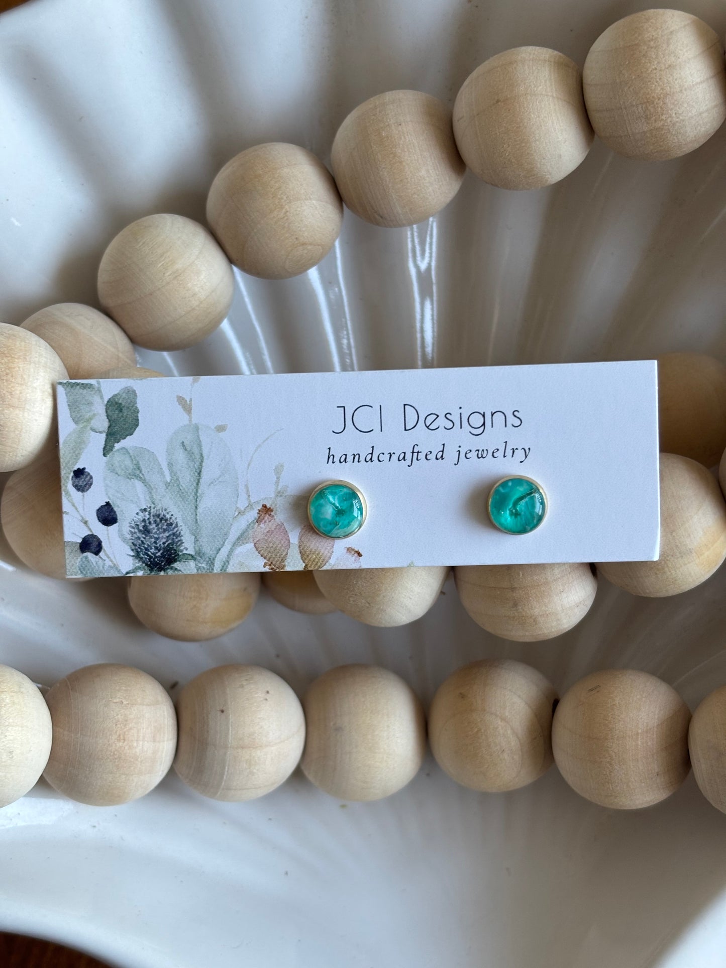 Gold micro studs in turquoise