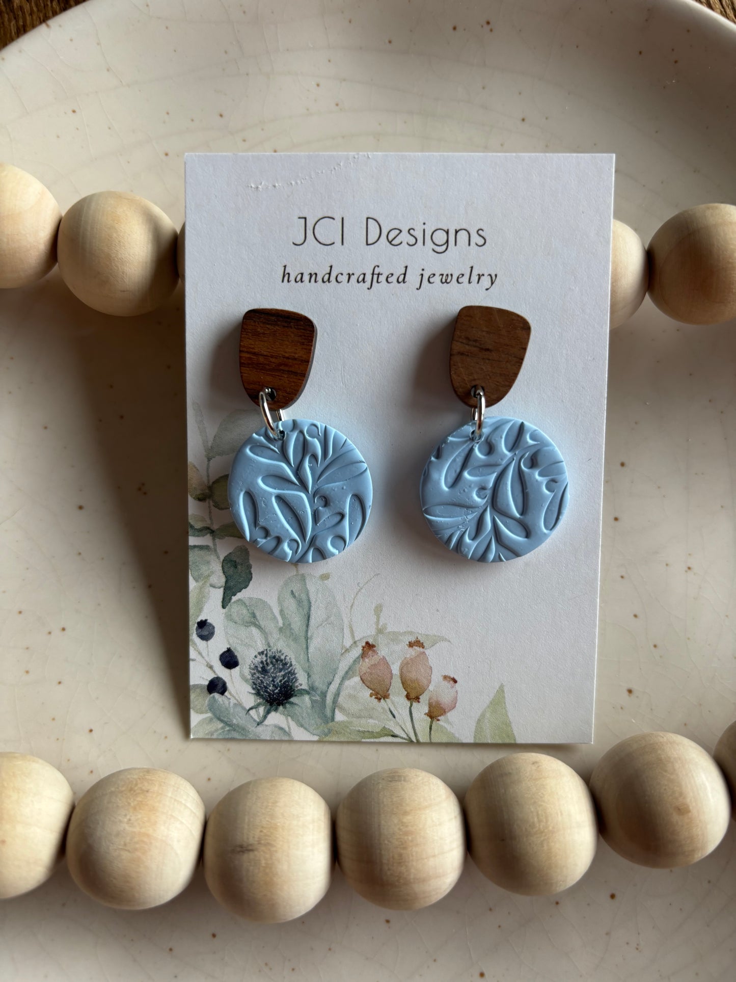 Leaf print danglers in periwinkle
