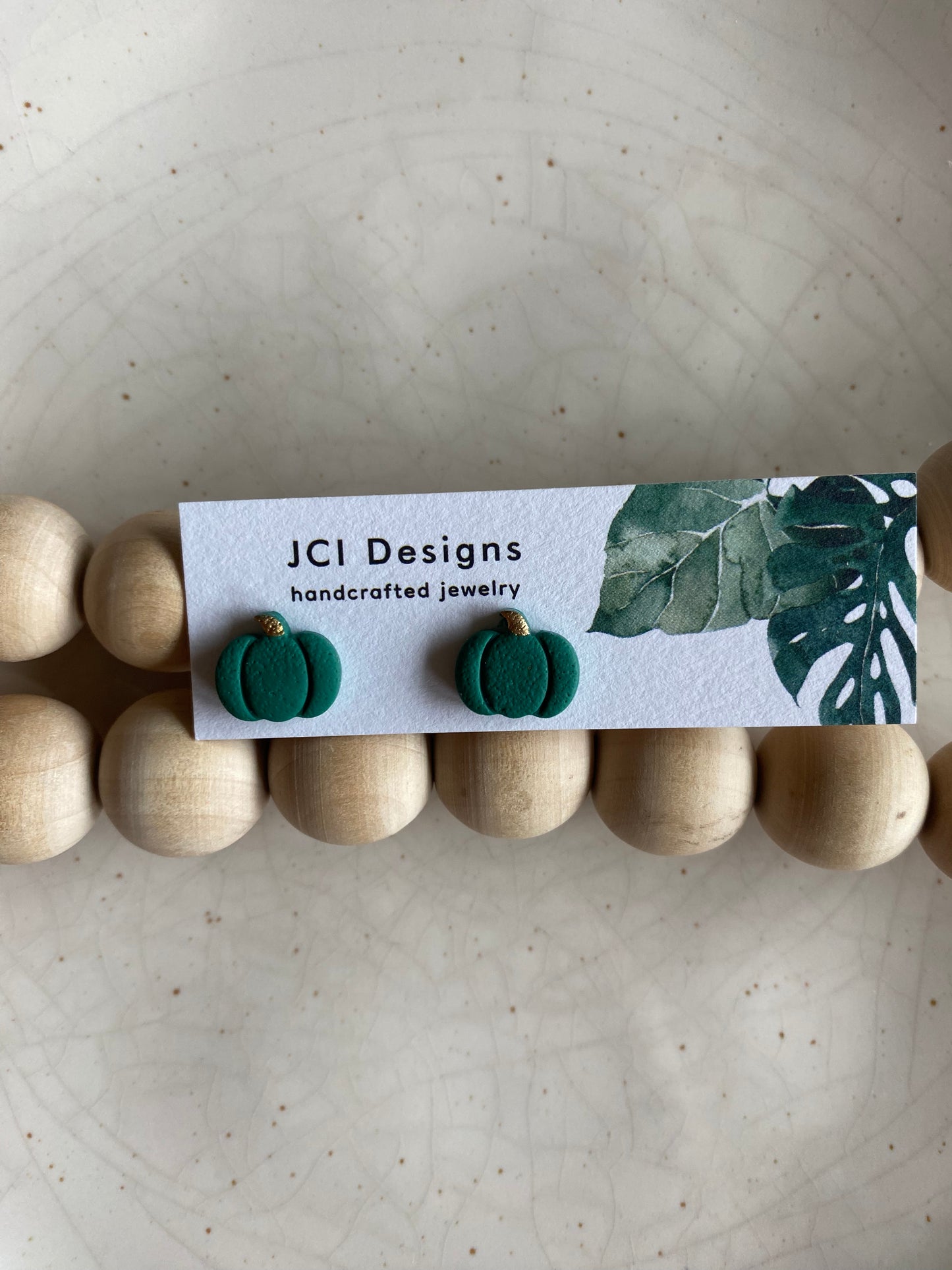 Pumpkin studs in forest green