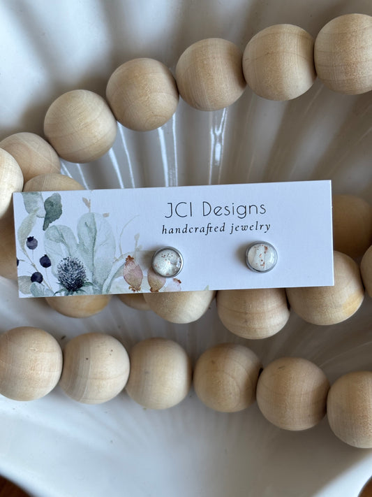 Silver micro studs in white