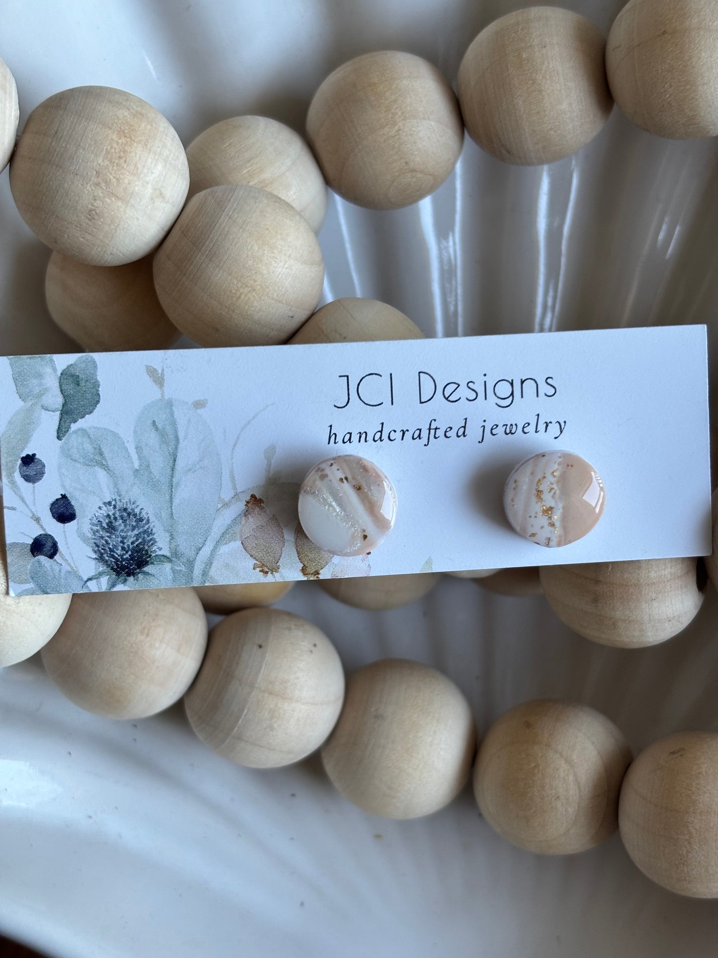 Button studs in white