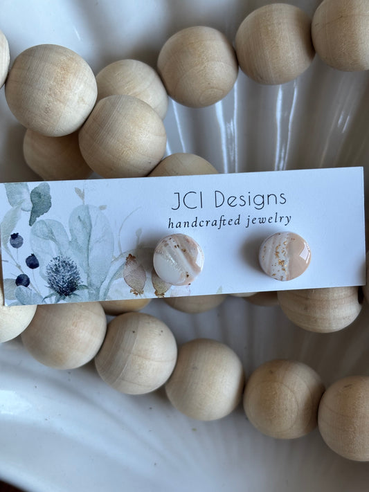 Button studs in white