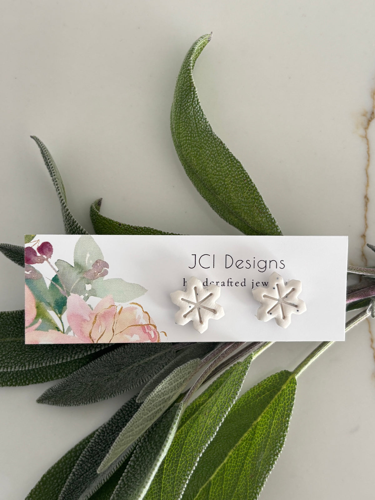 Snowflake studs
