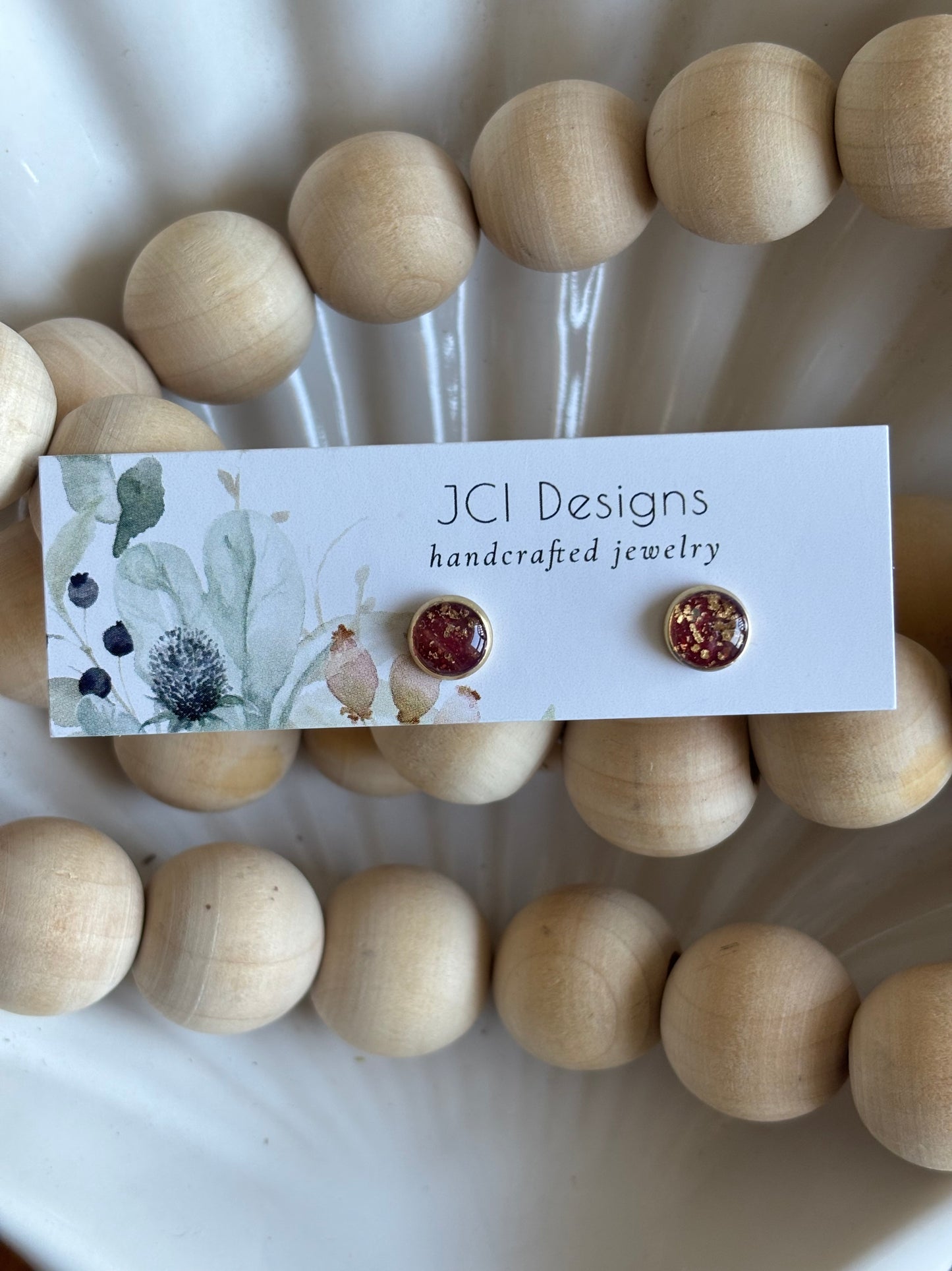 Gold micro studs in Merlot