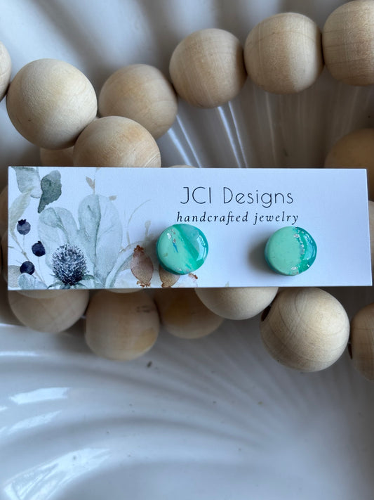 Button studs in teal