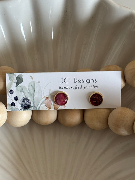 Gold midsized studs in Merlot