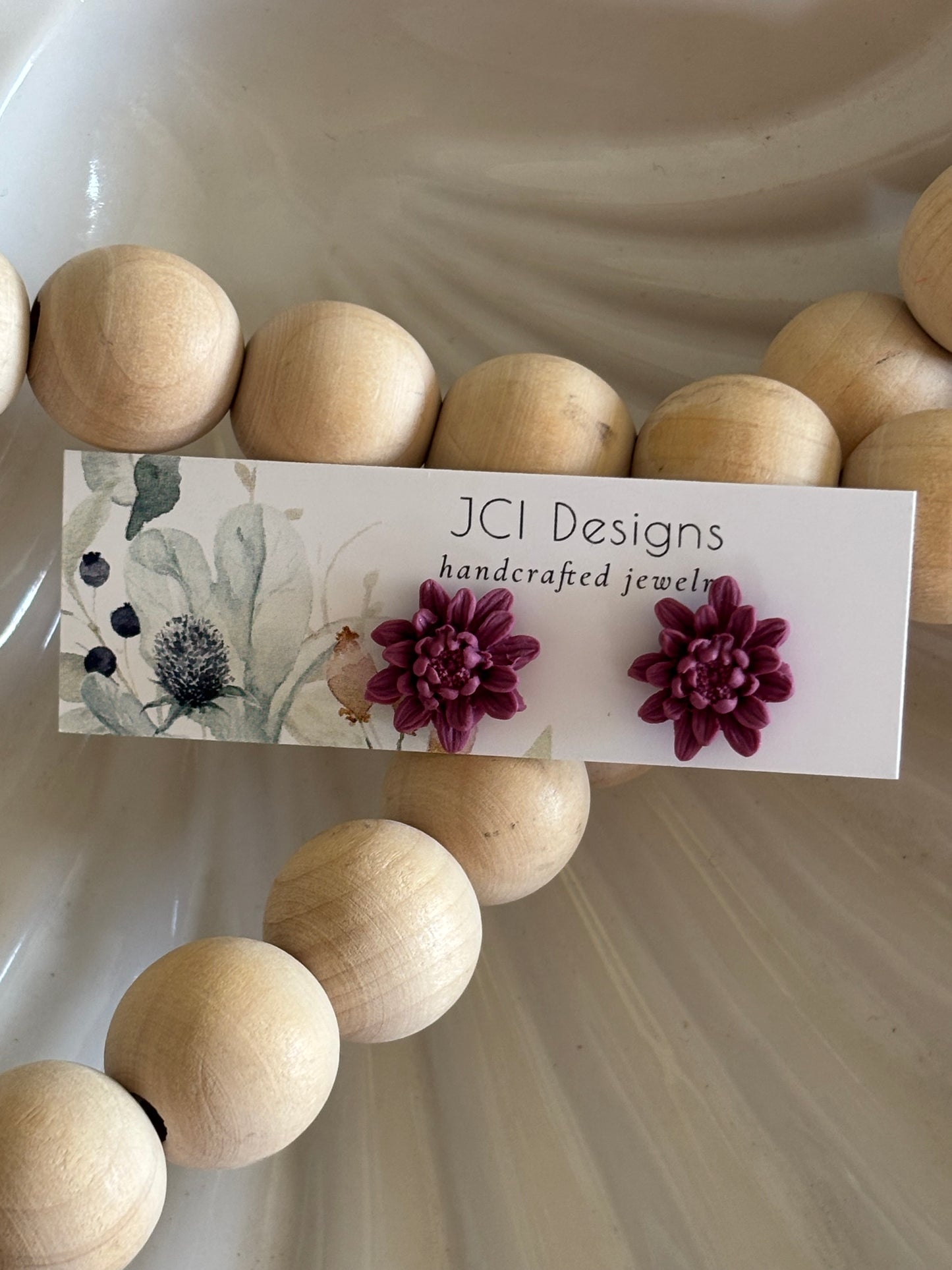 Flower studs in purple