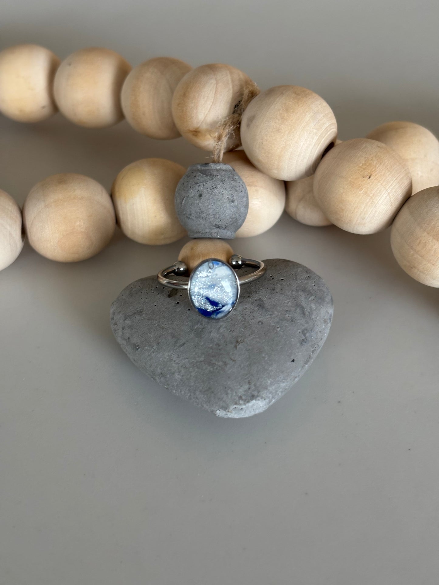 Silver oval ring in frost blue