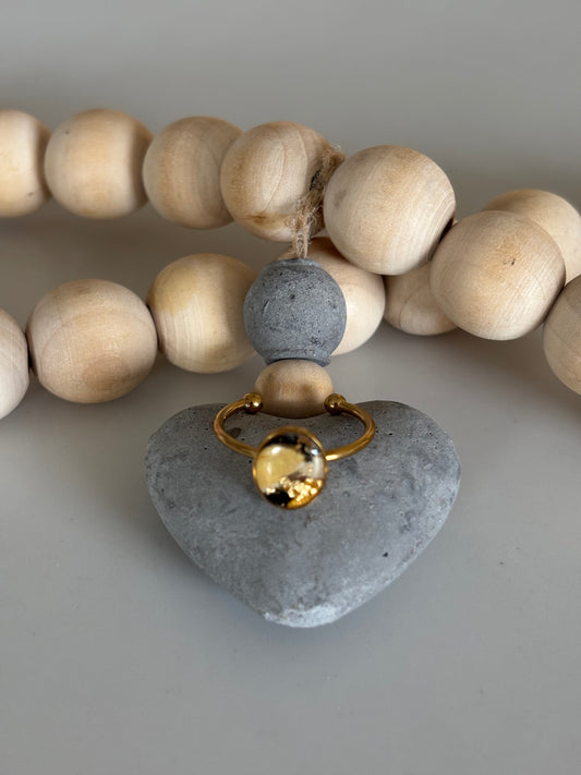 Gold oval ring in cats eye