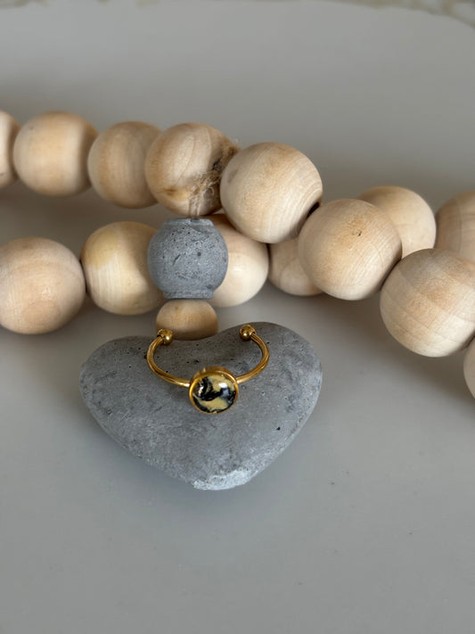 Gold circle ring in cats eye