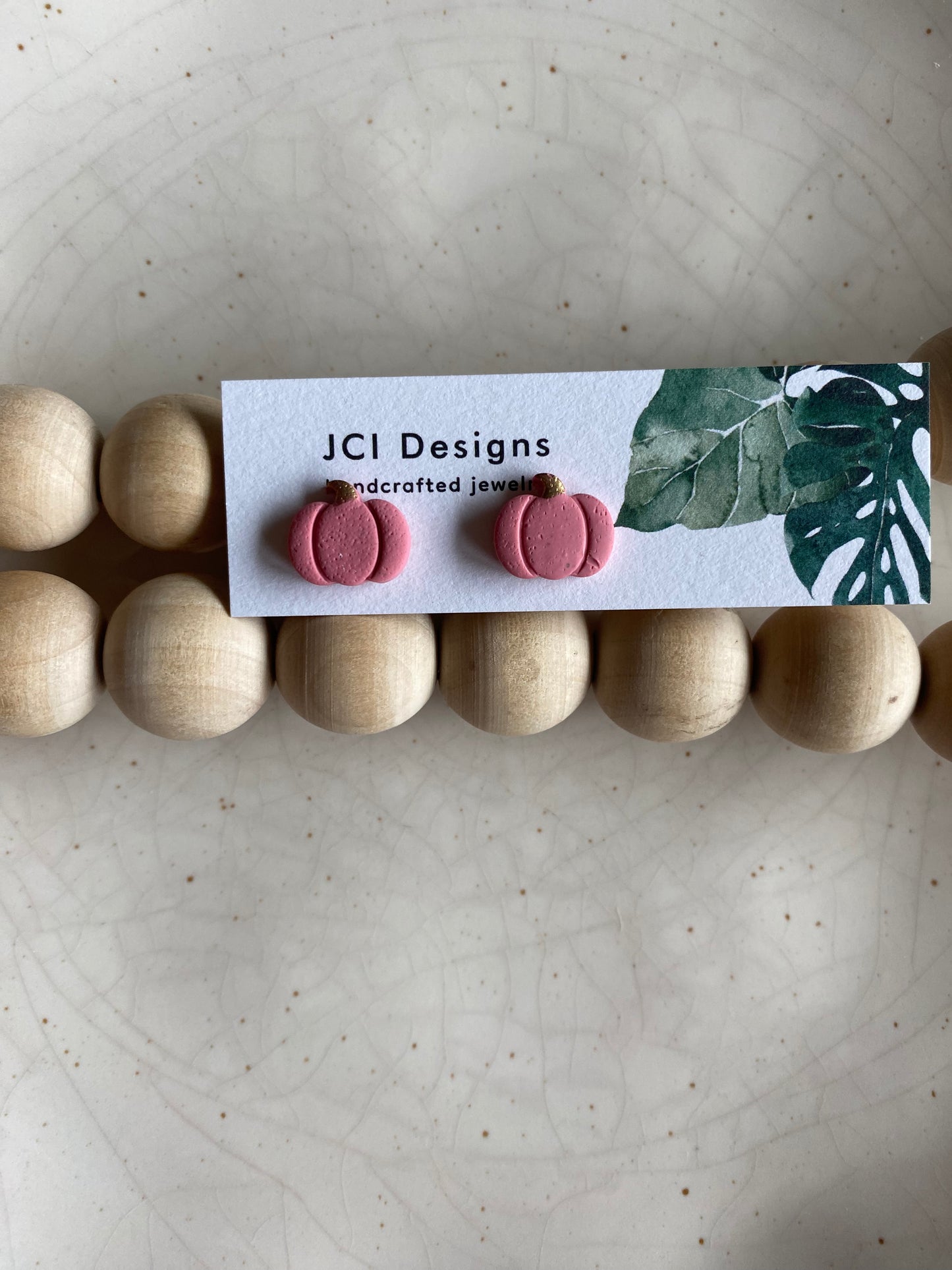 Pumpkin studs in pink