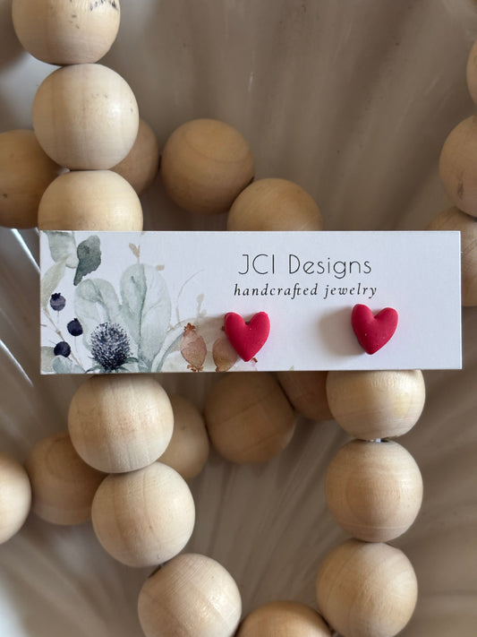 Heart studs in red