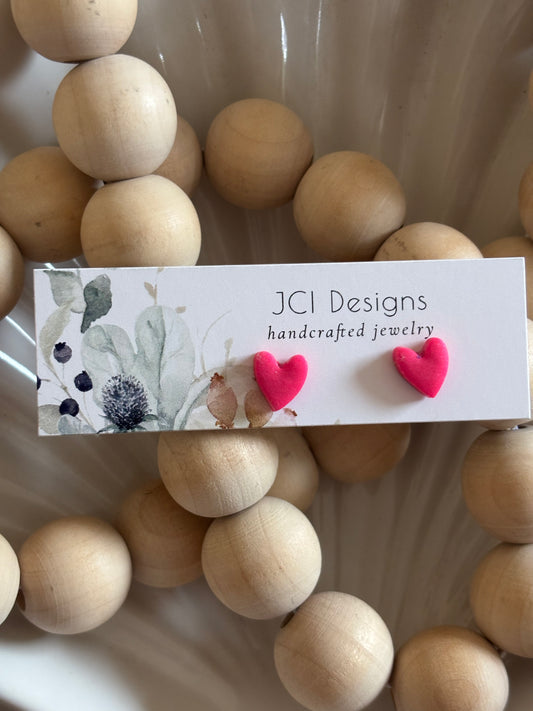 Heart studs in bright pink
