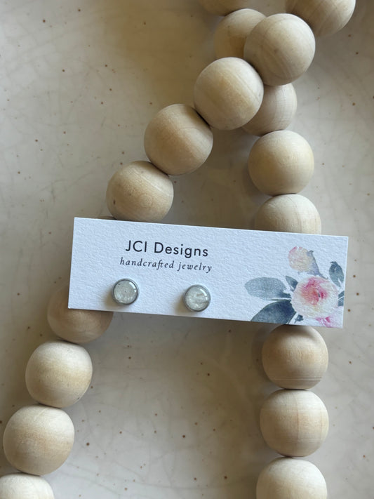 Silver micro studs in white