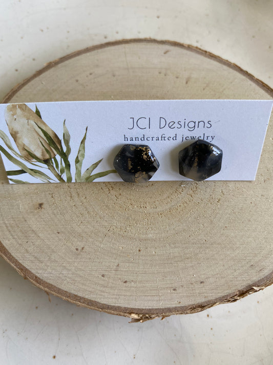 Hexagon studs in black and gold